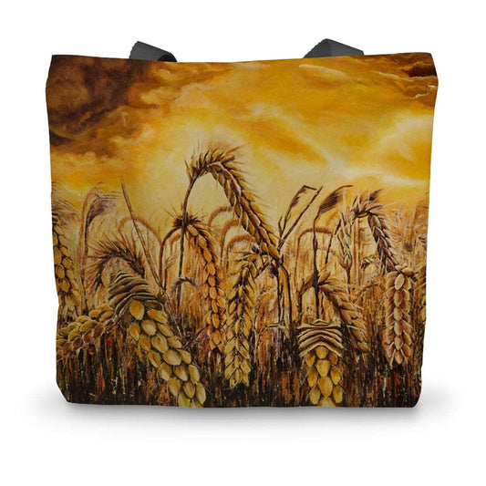 Artistic Durable Tote Bag Stormy Wheat Field has the most colourful golden heads of wheat in a field with dried grasses under a stormy sky that is lit up with brilliant light & dark, heavy clouds here n there