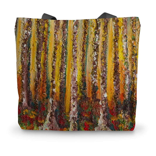 Artistic Durable Tote Bag Small Wood has a close up image of golden sunlight coming through the tall trees of loose bark & colour still in the leaves that have fallen to carpet the ground around