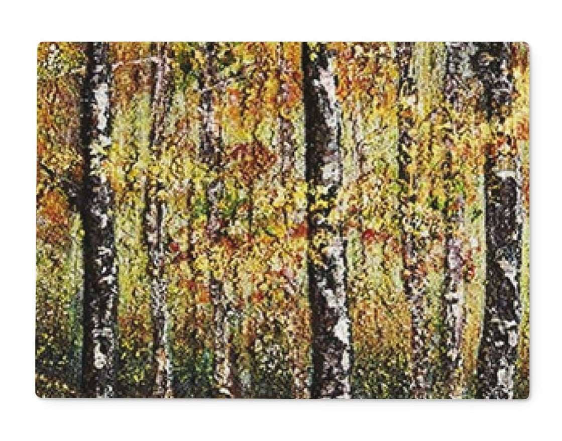 Rectangular Artistic Glass Cutting Board Forest of Gold with colours of a Canadian forest in the fall. Golds yellows bronzes and beautifully crafted trees. Nature in your kitchen while creating your meals can't be bad!