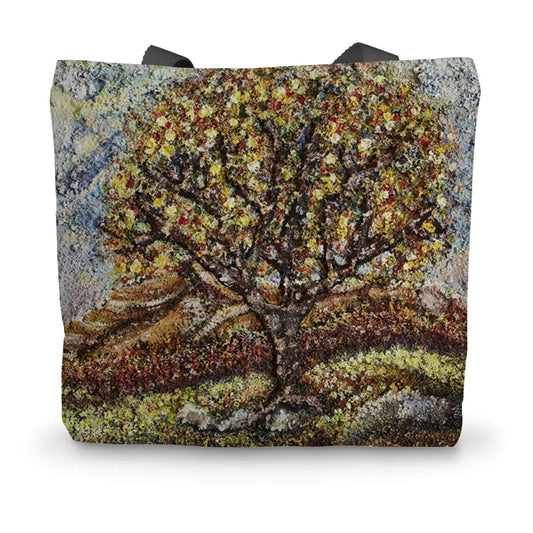 Artistic Friendship Tree Tote bag Cases has a very colourful tree in leaf, & fruits on an English moorland with lovely greens & greys for moss & moor rocks on the floor