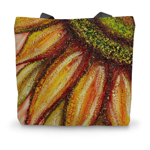 Artistic Durable Tote Bag Sunflower Passion has the centre of the sunflower in one corner of the bag & the mixtures of yellows, oranges reds & golden petals reaching across the bag. The centre is a beautiful emerald colour!