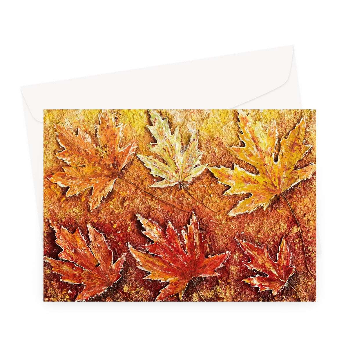 Artistic Blank Greeting Card Autumn Leaves shows a picture of real maple leaves paiinted in golds and Reddy browns, and a very light green also