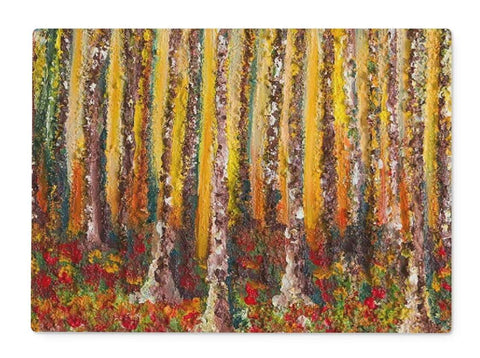 Rectangular Artistic Glass Cutting Board Small Wood with all the colours of autumn, tall tree truncs and coloured bark on the trees. The woods ground is covered in colour from the fallen leaves. Colouring your cooking experience