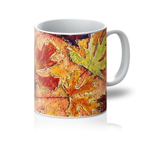 Artistic mug with maple leaves with vibrant playful colours