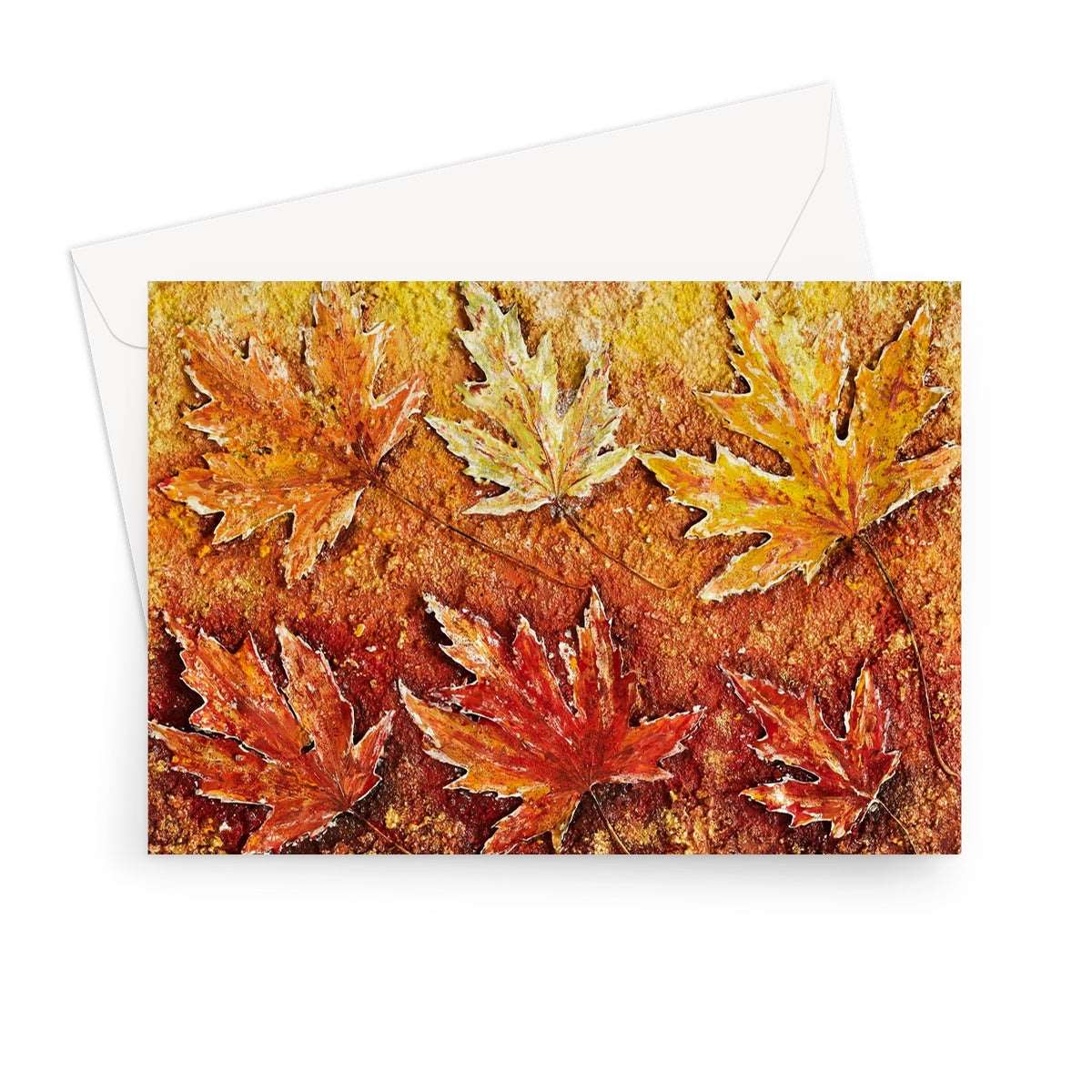 Artistic Blank Greeting Card Autumn Leaves shows a picture of real maple leaves paiinted in golds and Reddy browns, and a very light green also