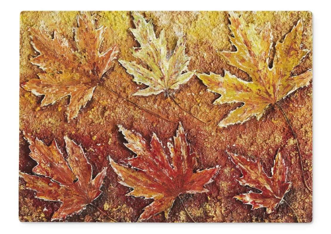 Artistic Glass Cutting Board Autumn Leaves has all the colours of autumn warm browns, caramels, golds & yellows, with maple leaves