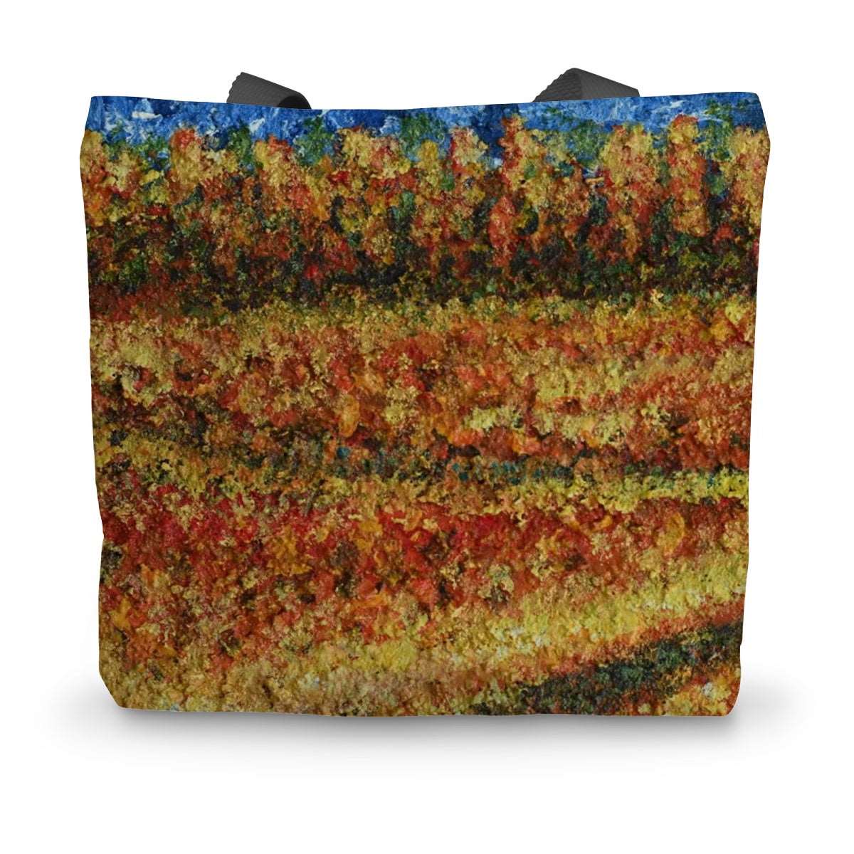 Walking Through Canada Tote Bag with a colourful path meandering through a golden field with warm colours also leading to trees in the distance and blue sky.