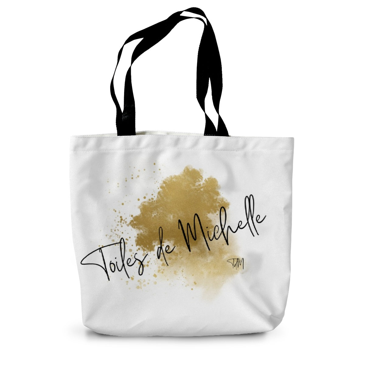 Logo written in black toiles de Michelle in a chic font that traverses the bag with gold splashes of paint underneath all on a white background. 