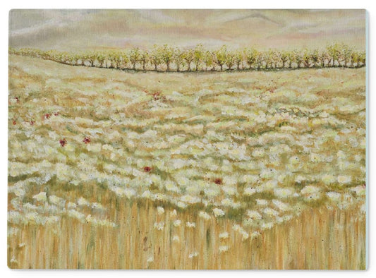 Artistic Glass Cutting Board Shades of a wild field has all the soft colours of beige & creamy white flower dancing in the field with the odd red poppy, trees in the background & a calm sky.