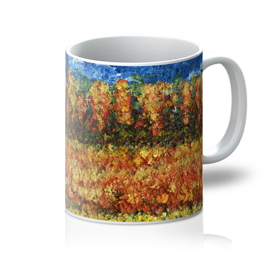 Walking Through Canada Mug has a beautiful, colourful image with a colourful path meandering through a golden field with warm colours also leading to trees in the distance and blue sky.