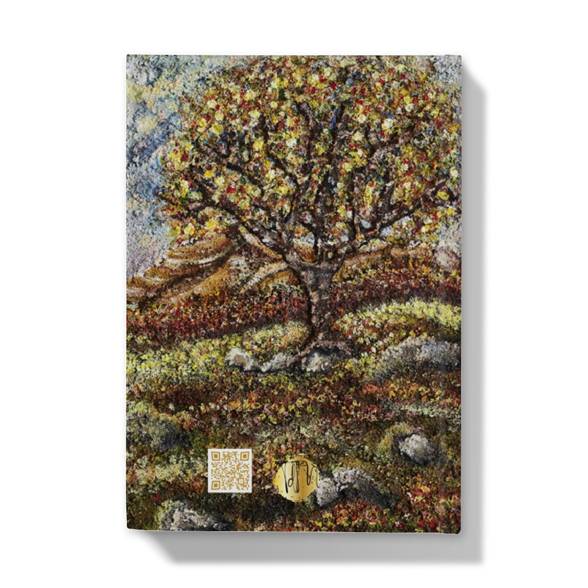 Friendship Tree Hardback Journal  with a beautiful colourful scene of a colourfl tree on an English moorland with hills in the background and rocks closer up with moss and leaves on the floor.