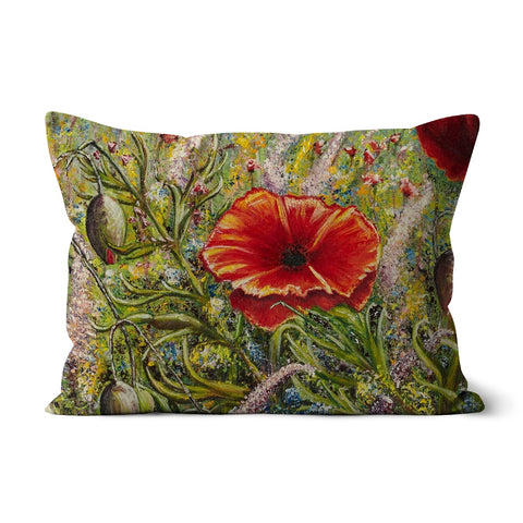 Poppy Love Cushion with an beautiful array of wild flowers in all soft shades of colours and red poppies dancing in mix