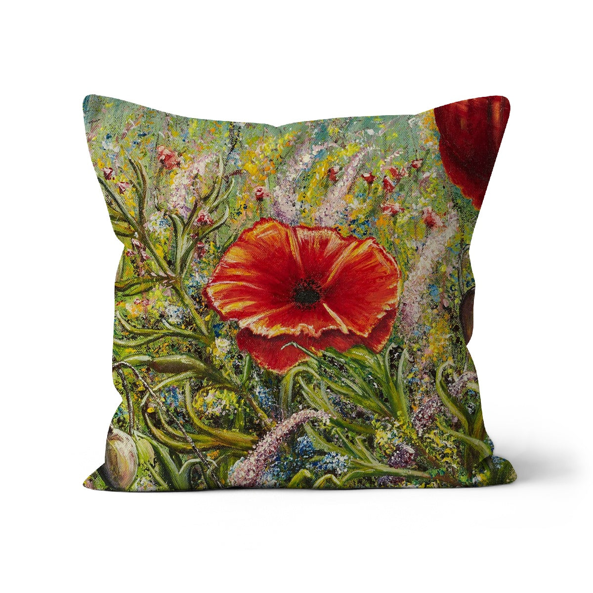 Poppy Love Cushion with an beautiful array of wild flowers in all soft shades of colours and red poppies dancing in mix