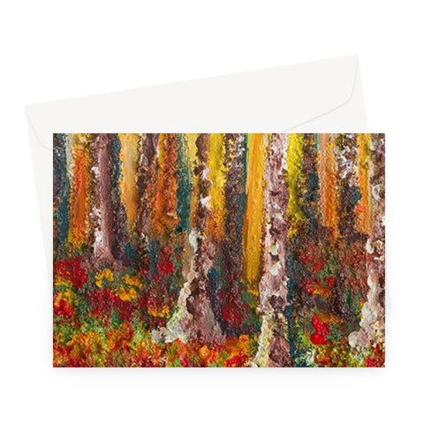 Artistic Small Wood Blank Greeting Card is a beautiful colourful image of tall tree trunks and the ground covered in fallen autumn leaves