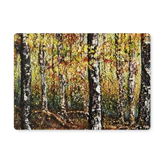 Artistic Placemats Forest of Gold  is a beautiful forest of yellows, auburns & golds with the reds of the forest floor.  Beautiful artwork by Michelle Roberts