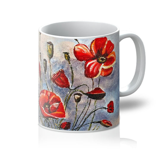 Artistic Coffee Mug Bouquet of Poppies is beautifully degined with free flowing re poppies open & closed with a natural slate blue background & hints of soft shades of pinks.