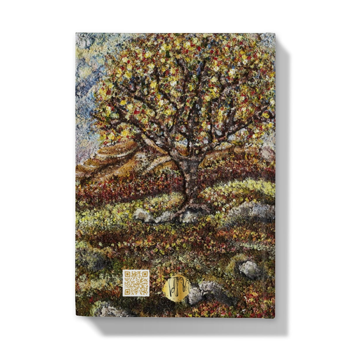 Friendship Tree Hardback Journal  with a beautiful colourful scene of a colourfl tree on an English moorland with hills in the background and rocks closer up with moss and leaves on the floor.