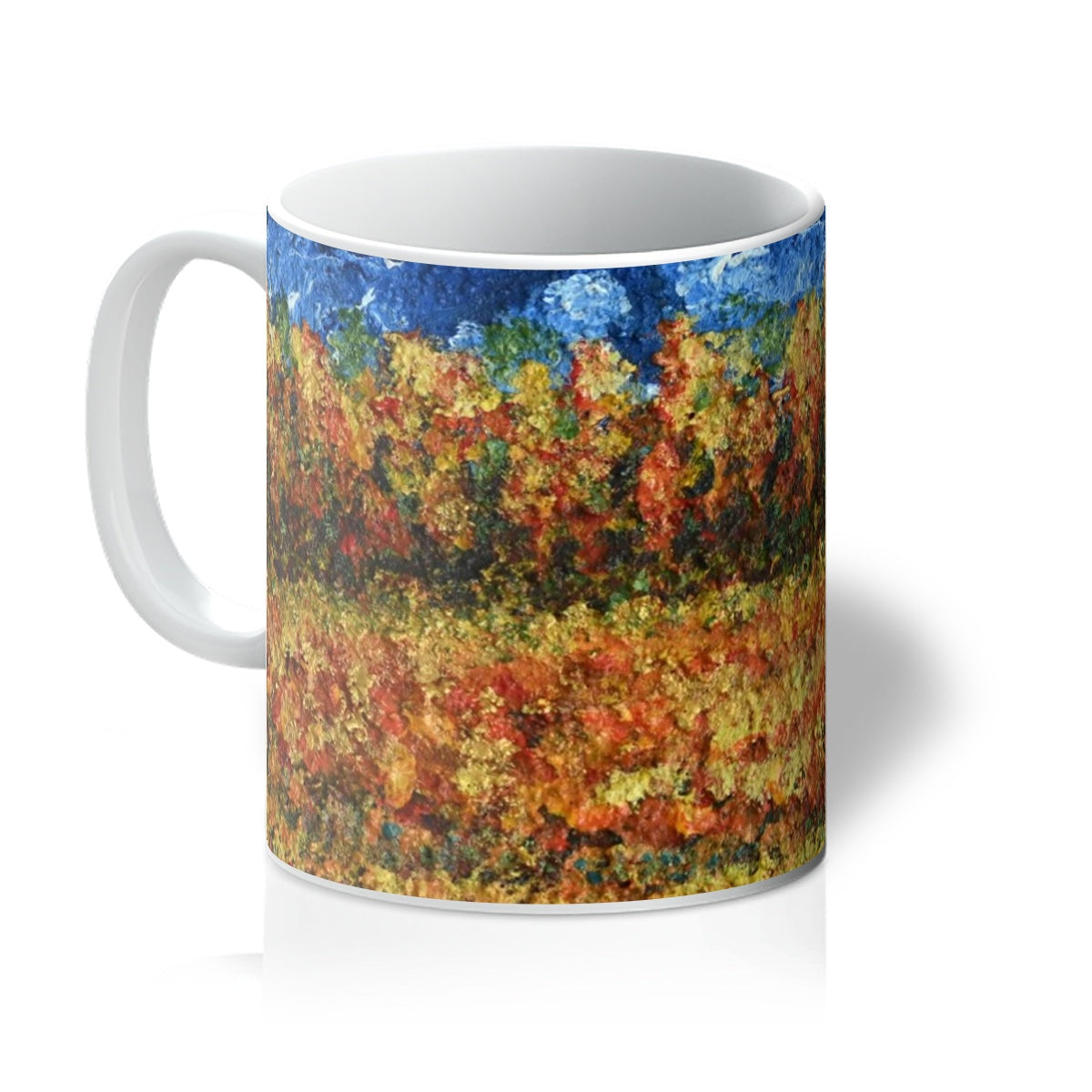 Walking Through Canada Mug has a beautiful, colourful image with a colourful path meandering through a golden field with warm colours also leading to trees in the distance and blue sky.