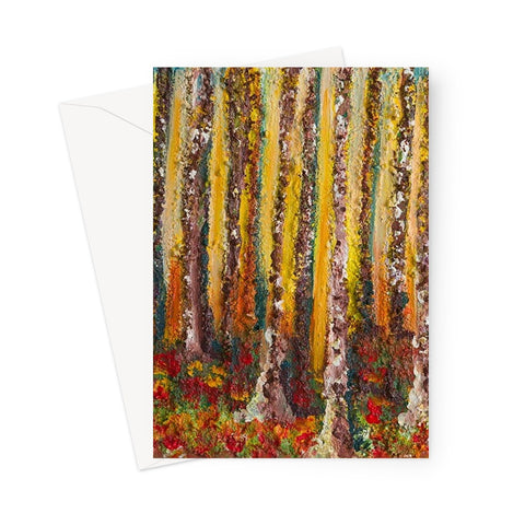 Artistic Small Wood Blank Greeting Card is a beautiful colourful image of tall tree trunks and the ground covered in fallen autumn leaves