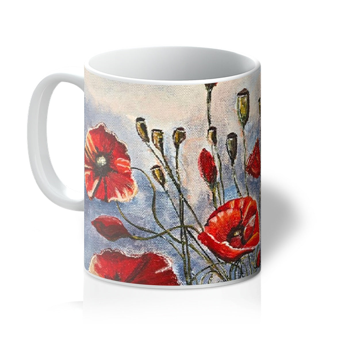 Artistic Coffee Mug Bouquet of Poppies is beautifully degined with free flowing re poppies open & closed with a natural slate blue background & hints of soft shades of pinks.