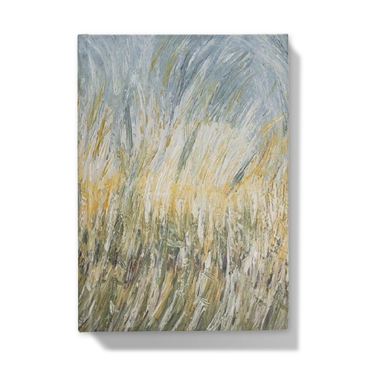 Wheat fields Hardback Journal has an abstract image of wheat swaying in the fields of golds light sage greens & light blues towards the sky.