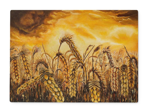 Stormy Wheat Field Glass Chopping Board is round and hshows a closer look at the beautiful golden coloured curved heads of wheat in the field, and the bright storm behind.