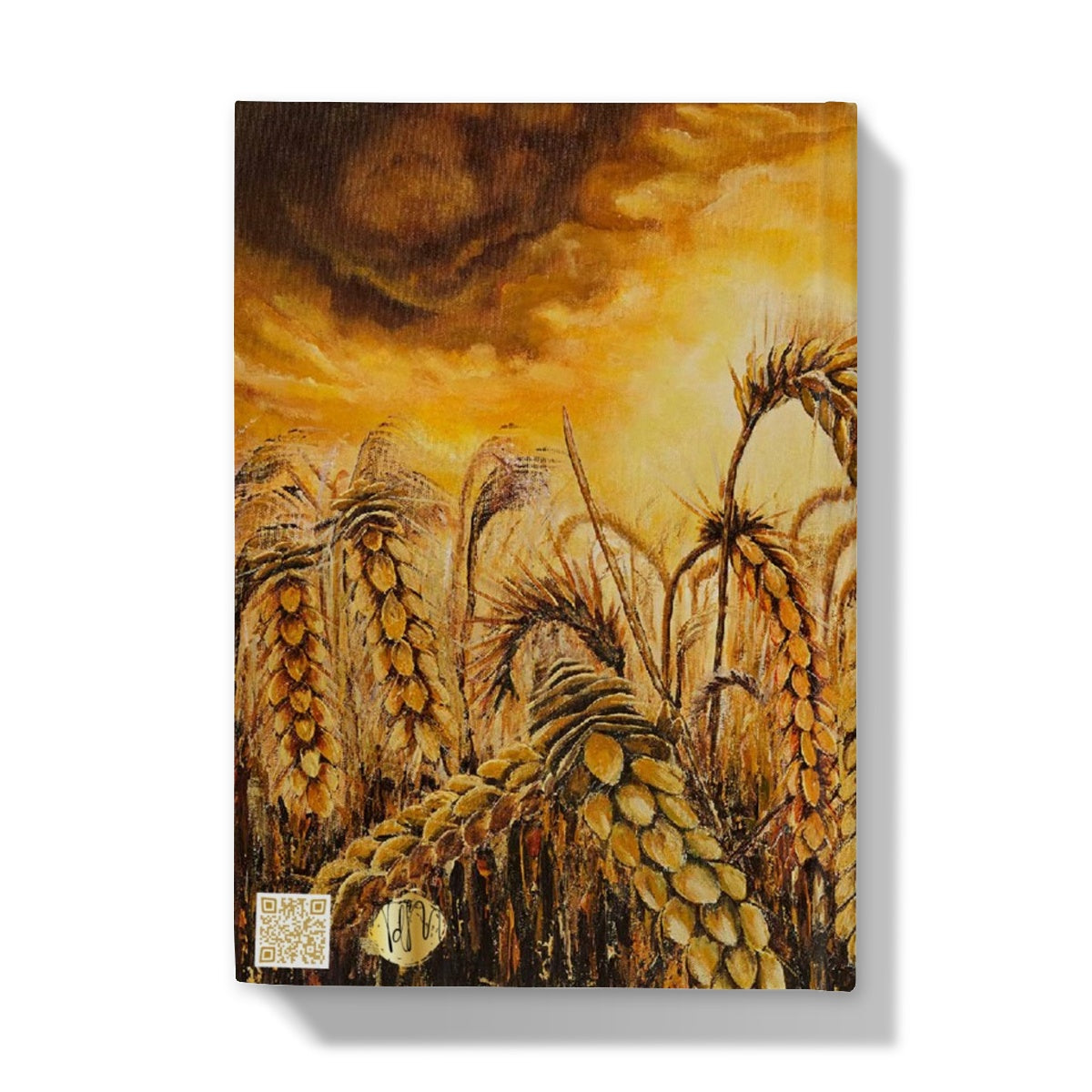 Stormy Wheat Field Hardback Journal with golden colours, auburn caramel heads of wheat & a very brightly light up stormy sky in browns & oranges & white flashes of sunlight