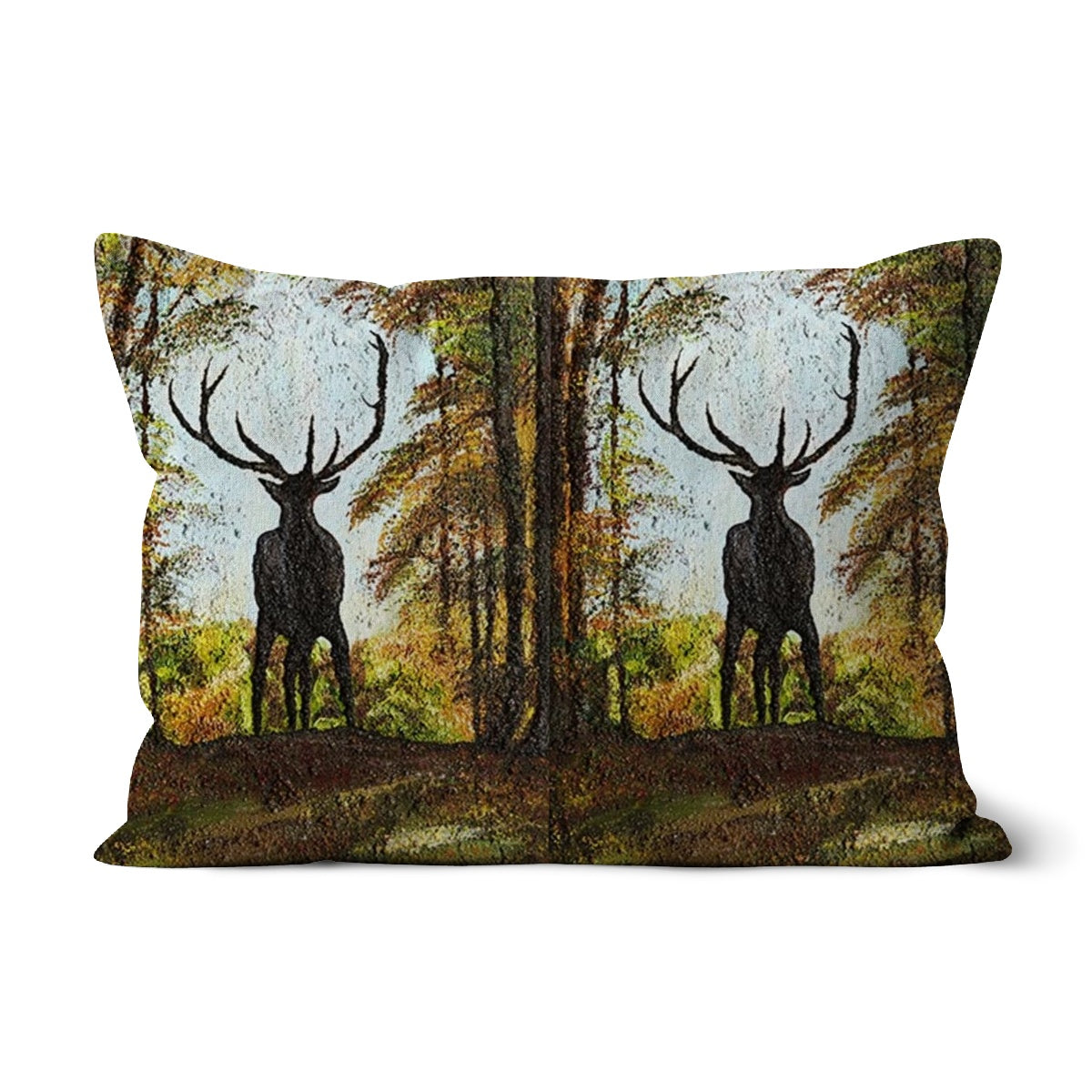 Proud Stag Throw Pillow with Art has the stag in silhouette on the cusp of a hill  against his natural habitat of a forest, blue sky behind his head and antlers