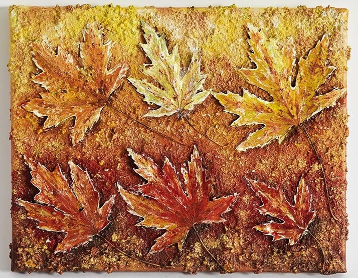 Wall Art Canvas Print painting of golden colours of autumn of maple leaves. Six leaves three above the other three which are golden in colour, underneath caramels & bronzes. The original piece has lots of texture as this piece has all the same looks &  nuances without the lumps & bumps to feel.