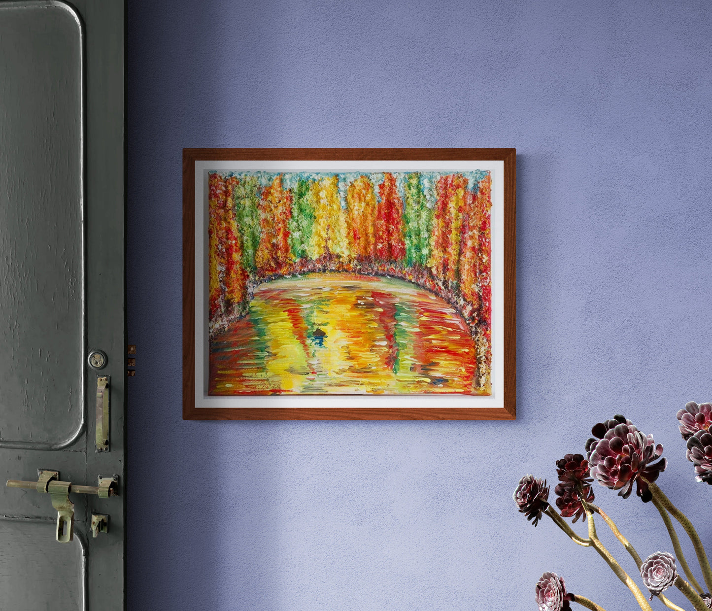 Wall Art Canvas  Print Reflections A very colourful piece of art of Canadian trees around a lake reflecting the colours in the water.  The texture difference between the trees & water makes this piece stand out.  All the colours are autumnal colours found in the fall in Canada: yellows, greens reds, orange.  A real feast for the eyes!  Picture mounted onto a pale violet colour & framed in wood